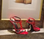 CASSANDRA FLAT SANDALS IN CROCODILE-EMBOSSED LEATHER WITH GOLD-TONE MONOGRAM