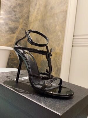 CASSANDRA FLAT SANDALS IN CROCODILE-EMBOSSED LEATHER WITH GOLD-TONE MONOGRAM