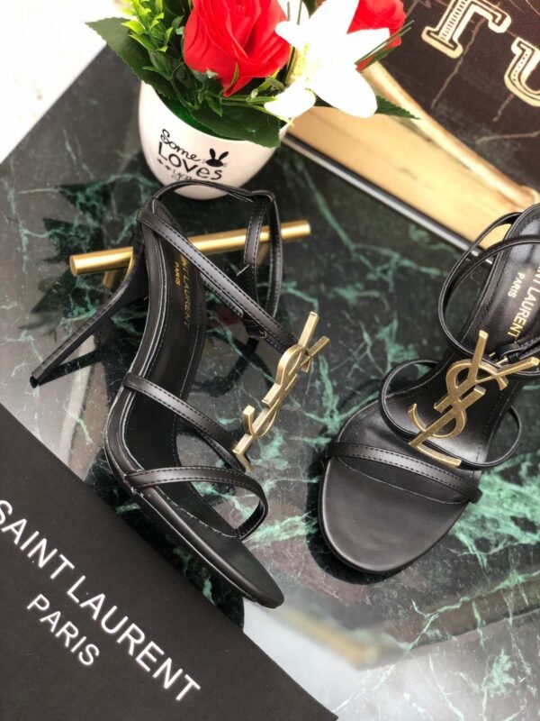 CASSANDRA FLAT SANDALS IN CROCODILE-EMBOSSED LEATHER WITH GOLD-TONE MONOGRAM