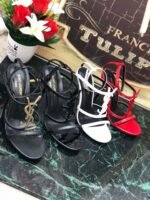 CASSANDRA FLAT SANDALS IN CROCODILE-EMBOSSED LEATHER WITH GOLD-TONE MONOGRAM