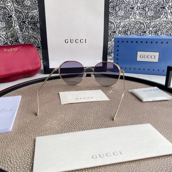 Chloé Eyewear engraved-logo round-frame sunglasses