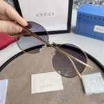 Chloé Eyewear engraved-logo round-frame sunglasses