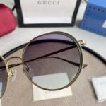 Chloé Eyewear engraved-logo round-frame sunglasses