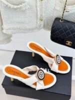 Chanel Cross Strap Mules with Oversized Double C Buckle